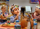 ThanksgivingKids-prayer copy  Fellers Wise, 3, center, holds his hands in prayer as he and other children in Jennifer Owen and Katherine Wise&#39;s preschool class have a Thanksgiving lunch at First Presbyterian Church&#39;s Child Development Center in Spartanburg Monday, 11-22-04.  (NOTE: Stand-alone)